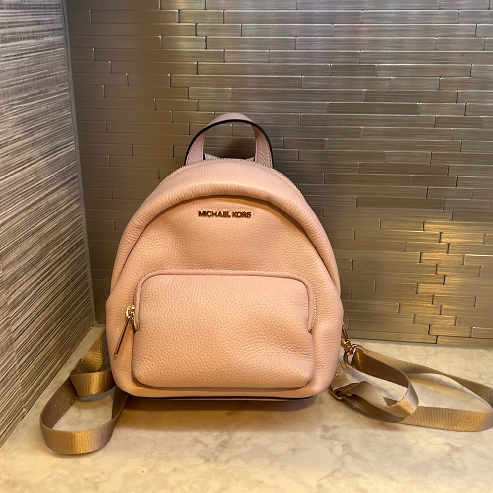 BRAND NEW micheal kors backpack in pink still with tags gold accents**
